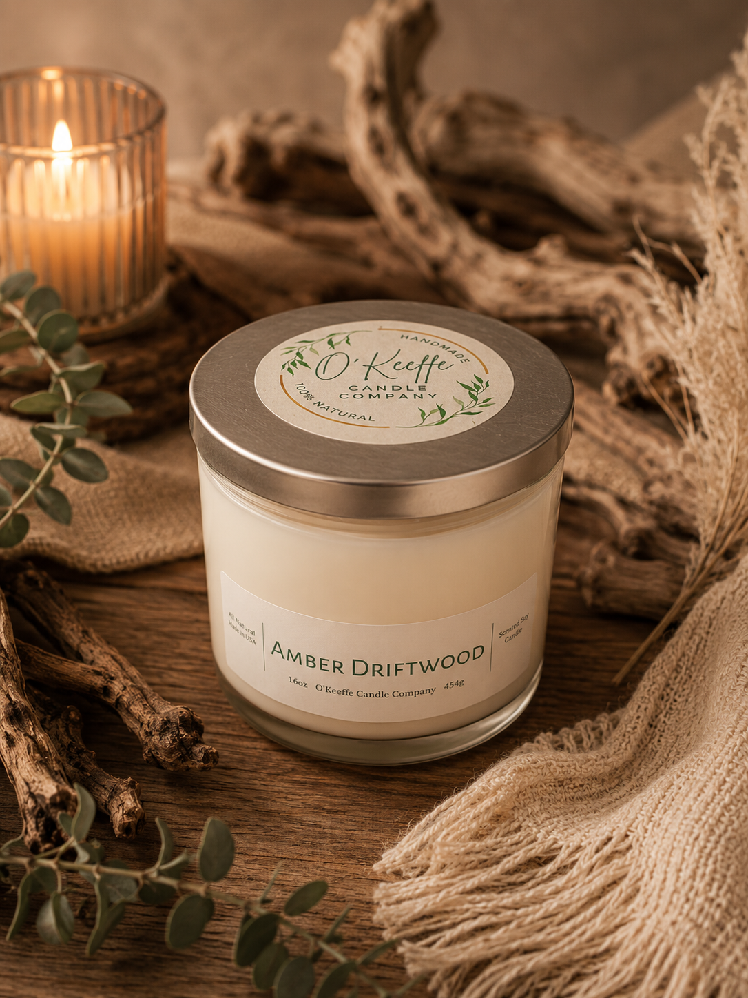 Amber Driftwood soy candle with rich coastal warmth in elegant modern home setting 